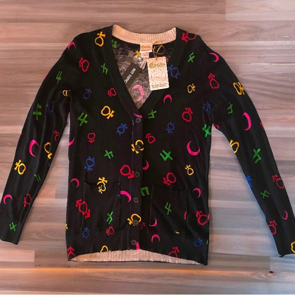 Sailor Moon HotTopic Exclusive Fashion Collection Black Cardigan zodiac symbols.